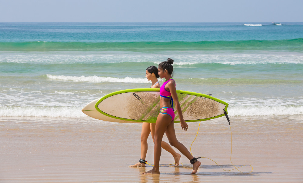 On the beach with a board at first light